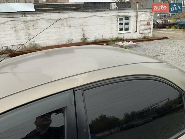 Бежевый Дэу Ланос, объемом двигателя 1.5 л и пробегом 155 тыс. км за 2100 $, фото 9 на Automoto.ua