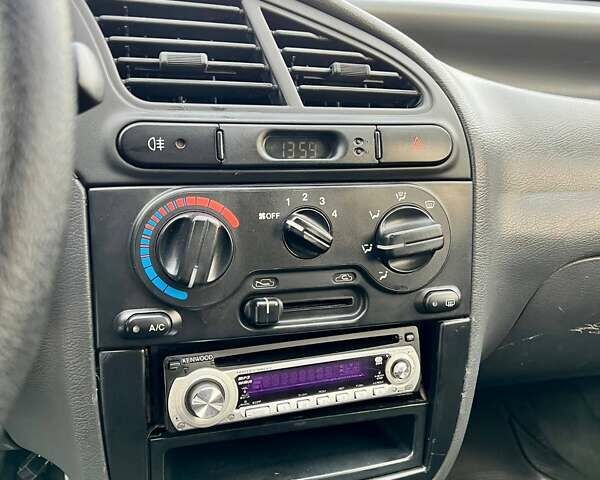 Бежевый Дэу Ланос, объемом двигателя 1.6 л и пробегом 225 тыс. км за 2499 $, фото 13 на Automoto.ua