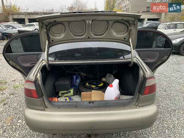 Бежевый Дэу Ланос, объемом двигателя 1.5 л и пробегом 155 тыс. км за 2100 $, фото 2 на Automoto.ua