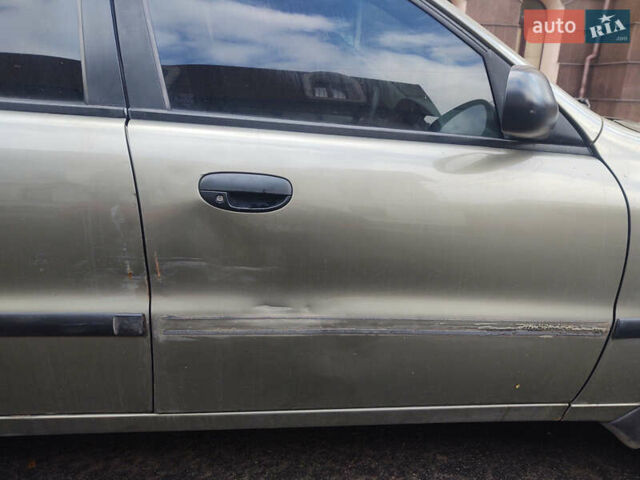 Бежевый Дэу Ланос, объемом двигателя 1.5 л и пробегом 177 тыс. км за 2000 $, фото 6 на Automoto.ua