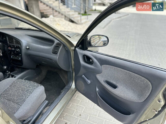 Бежевий Деу Ланос, об'ємом двигуна 1.5 л та пробігом 221 тис. км за 1350 $, фото 23 на Automoto.ua