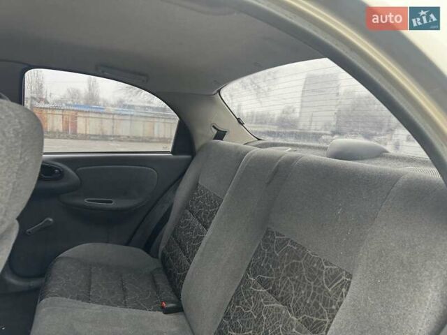 Бежевий Деу Ланос, об'ємом двигуна 1.5 л та пробігом 172 тис. км за 1750 $, фото 19 на Automoto.ua