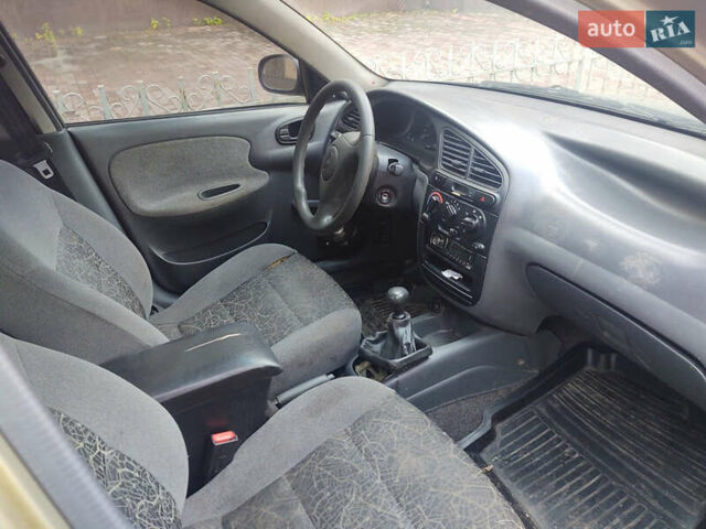 Бежевый Дэу Ланос, объемом двигателя 1.5 л и пробегом 177 тыс. км за 2000 $, фото 12 на Automoto.ua