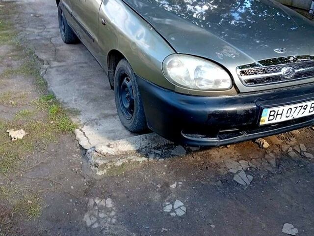 Бежевий Деу Ланос, об'ємом двигуна 1.4 л та пробігом 214 тис. км за 1500 $, фото 1 на Automoto.ua