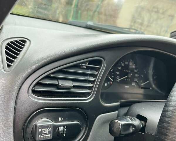 Бежевий Деу Ланос, об'ємом двигуна 1.6 л та пробігом 118 тис. км за 3300 $, фото 15 на Automoto.ua