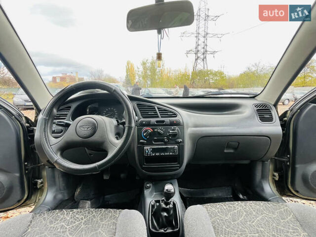 Деу Ланос 2007 у Харкові на Automoto.ua Бежевий Деу Ланос, об'ємом двигуна 1.5 л та пробігом 243 тис. км за 2500 $, фото 12 на Automoto.ua