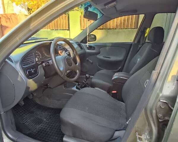 Бежевый Дэу Ланос, объемом двигателя 1.5 л и пробегом 106 тыс. км за 3000 $, фото 6 на Automoto.ua