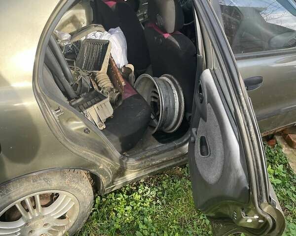 Бежевый Дэу Ланос, объемом двигателя 1.39 л и пробегом 226 тыс. км за 800 $, фото 14 на Automoto.ua