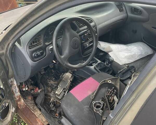 Бежевый Дэу Ланос, объемом двигателя 1.39 л и пробегом 226 тыс. км за 800 $, фото 10 на Automoto.ua