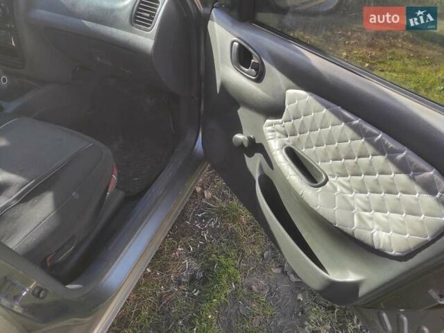 Бежевый Дэу Ланос, объемом двигателя 1.5 л и пробегом 325 тыс. км за 1500 $, фото 8 на Automoto.ua