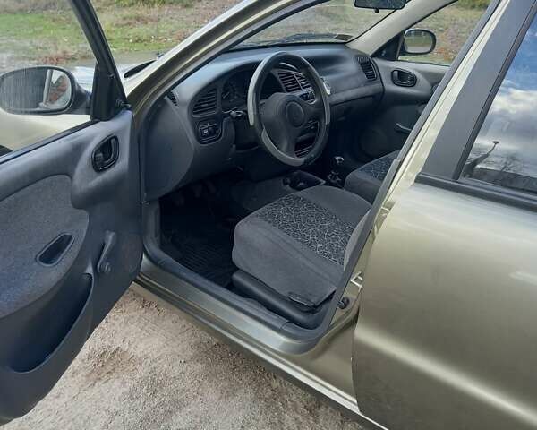 Бежевый Дэу Ланос, объемом двигателя 1.5 л и пробегом 163 тыс. км за 2300 $, фото 6 на Automoto.ua