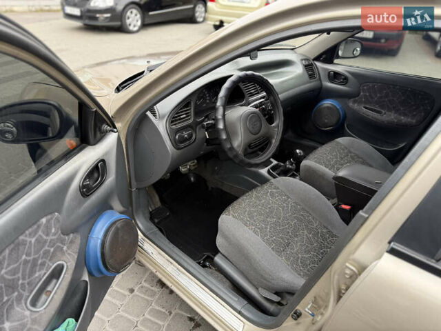 Бежевий Деу Ланос, об'ємом двигуна 1.5 л та пробігом 224 тис. км за 2550 $, фото 12 на Automoto.ua
