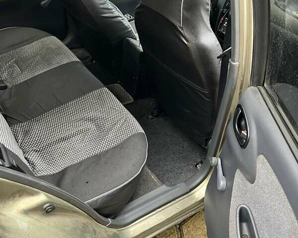 Бежевий Деу Ланос, об'ємом двигуна 1.6 л та пробігом 118 тис. км за 3300 $, фото 10 на Automoto.ua