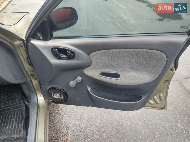 Бежевый Дэу Ланос, объемом двигателя 1.5 л и пробегом 177 тыс. км за 2000 $, фото 11 на Automoto.ua