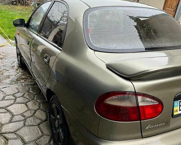 Бежевий Деу Ланос, об'ємом двигуна 1.6 л та пробігом 118 тис. км за 3300 $, фото 2 на Automoto.ua