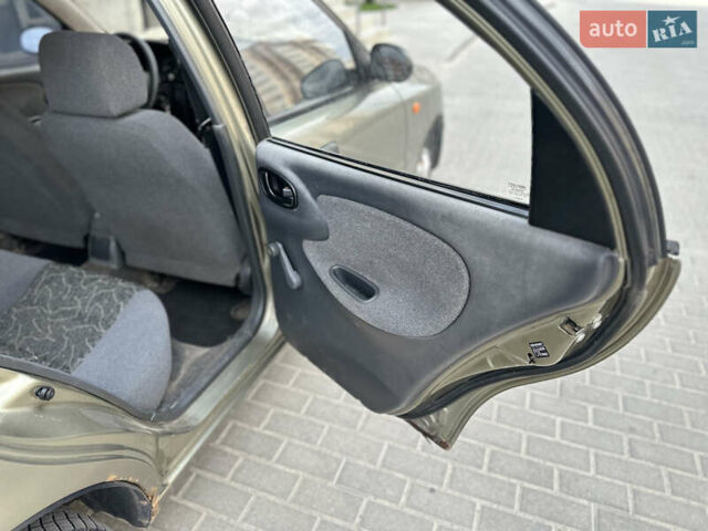 Бежевий Деу Ланос, об'ємом двигуна 1.5 л та пробігом 221 тис. км за 1350 $, фото 21 на Automoto.ua