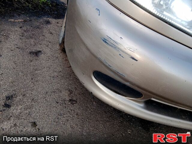 Бежевый Дэу Ланос, объемом двигателя 1.5 л и пробегом 208 тыс. км за 1300 $, фото 9 на Automoto.ua