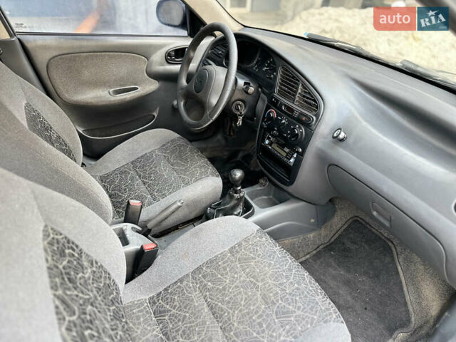 Бежевий Деу Ланос, об'ємом двигуна 1.5 л та пробігом 221 тис. км за 1350 $, фото 25 на Automoto.ua