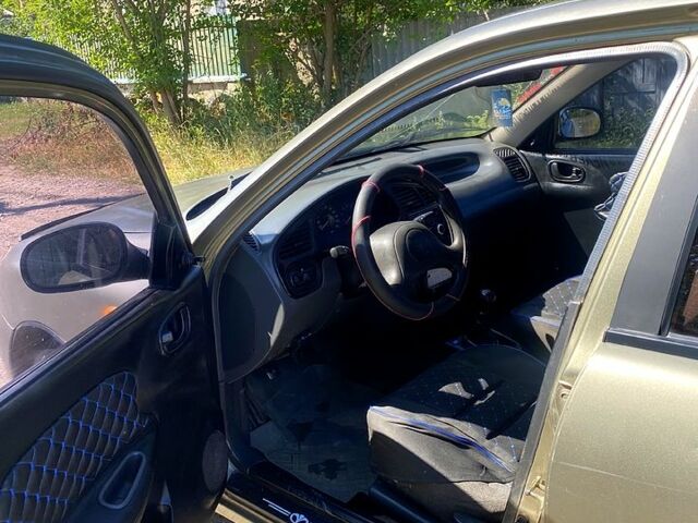 Бежевый Дэу Ланос, объемом двигателя 1.5 л и пробегом 0 тыс. км за 1390 $, фото 4 на Automoto.ua