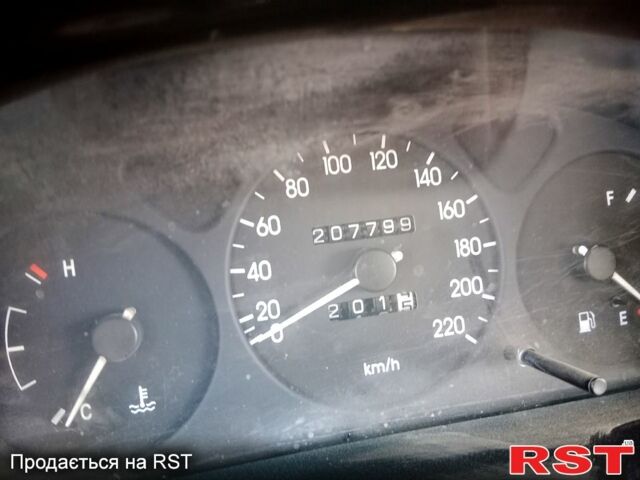 Бежевый Дэу Ланос, объемом двигателя 1.5 л и пробегом 208 тыс. км за 1300 $, фото 1 на Automoto.ua