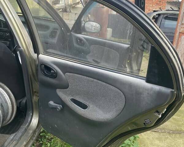 Бежевый Дэу Ланос, объемом двигателя 1.39 л и пробегом 226 тыс. км за 800 $, фото 13 на Automoto.ua