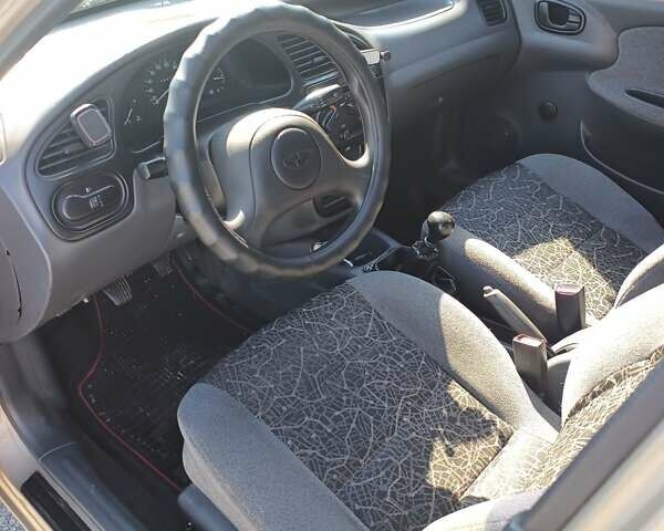 Бежевий Деу Ланос, об'ємом двигуна 1.5 л та пробігом 140 тис. км за 3100 $, фото 1 на Automoto.ua