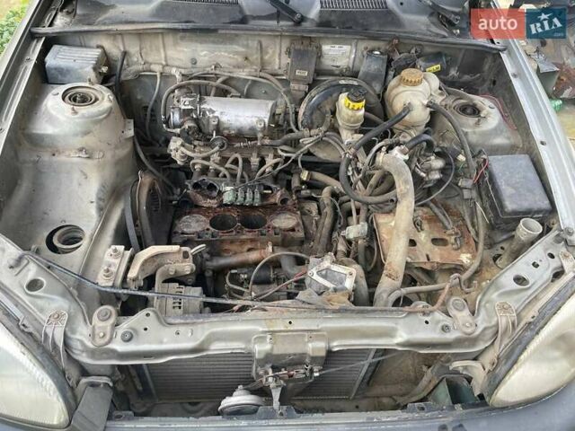 Бежевый Дэу Ланос, объемом двигателя 1.39 л и пробегом 226 тыс. км за 800 $, фото 7 на Automoto.ua