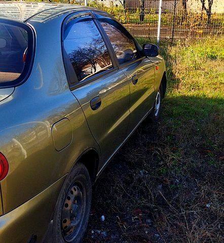 Бежевый Дэу Ланос, объемом двигателя 1.4 л и пробегом 192 тыс. км за 1200 $, фото 3 на Automoto.ua