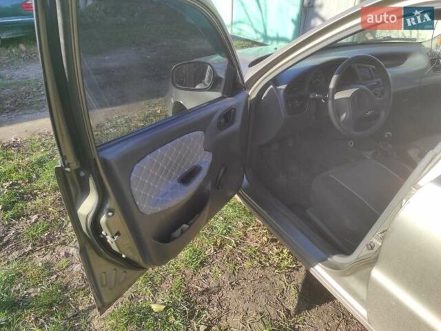 Бежевый Дэу Ланос, объемом двигателя 1.5 л и пробегом 325 тыс. км за 1500 $, фото 13 на Automoto.ua