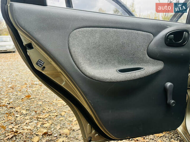 Деу Ланос 2007 у Харкові на Automoto.ua Бежевий Деу Ланос, об'ємом двигуна 1.5 л та пробігом 243 тис. км за 2500 $, фото 14 на Automoto.ua