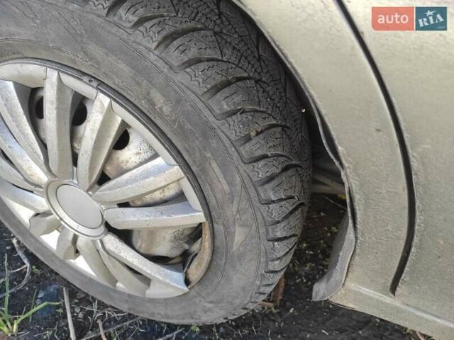 Бежевый Дэу Ланос, объемом двигателя 1.5 л и пробегом 325 тыс. км за 1500 $, фото 3 на Automoto.ua