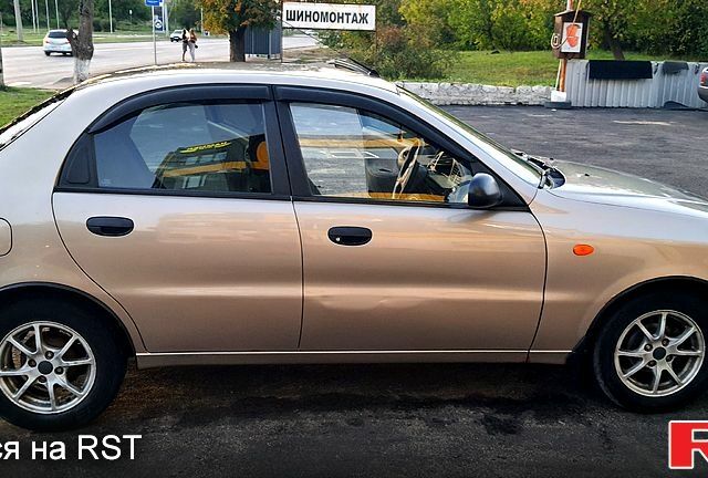 Бежевый Дэу Ланос, объемом двигателя 1.5 л и пробегом 170 тыс. км за 2200 $, фото 5 на Automoto.ua