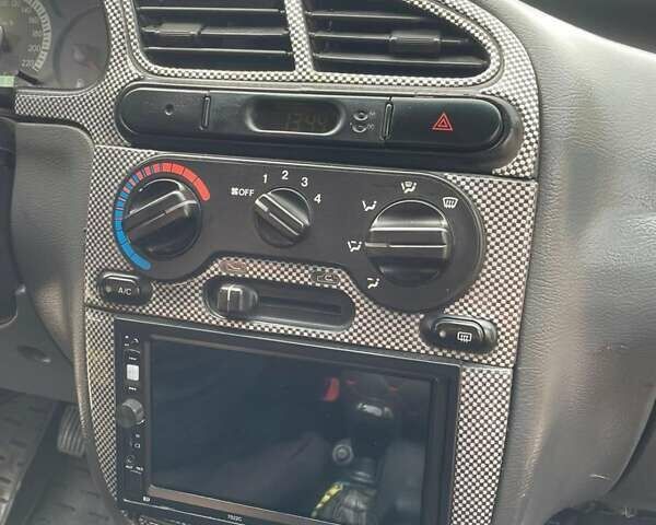Бежевый Дэу Ланос, объемом двигателя 1.5 л и пробегом 110 тыс. км за 2300 $, фото 4 на Automoto.ua