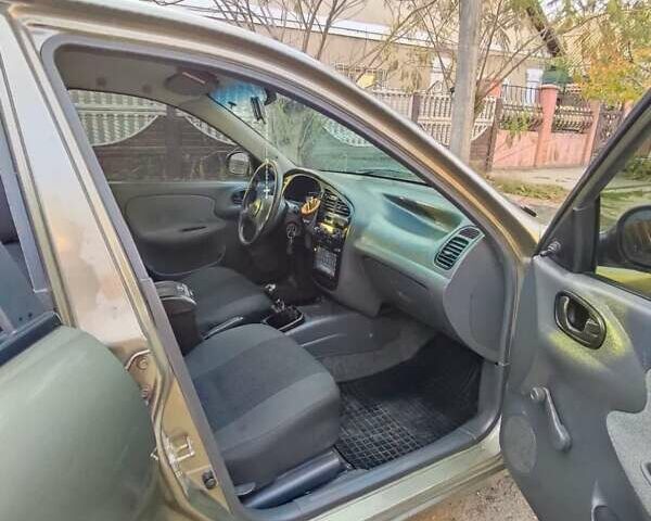 Бежевый Дэу Ланос, объемом двигателя 1.5 л и пробегом 106 тыс. км за 3000 $, фото 8 на Automoto.ua