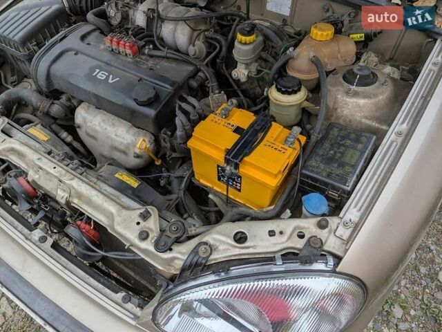 Бежевый Дэу Ланос, объемом двигателя 1.6 л и пробегом 162 тыс. км за 2700 $, фото 14 на Automoto.ua