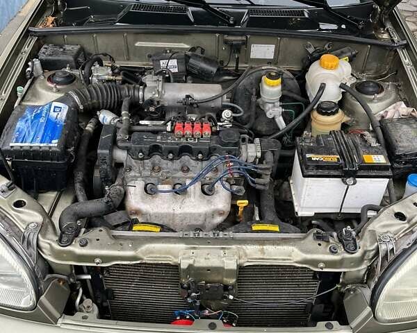 Бежевий Деу Ланос, об'ємом двигуна 1.6 л та пробігом 118 тис. км за 3300 $, фото 5 на Automoto.ua