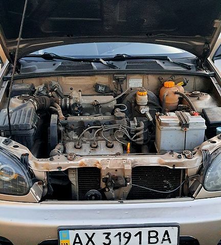 Бежевый Дэу Ланос, объемом двигателя 1.5 л и пробегом 170 тыс. км за 2200 $, фото 3 на Automoto.ua