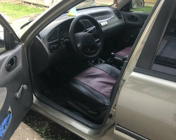 Бежевый Дэу Ланос, объемом двигателя 1.39 л и пробегом 155 тыс. км за 3200 $, фото 6 на Automoto.ua