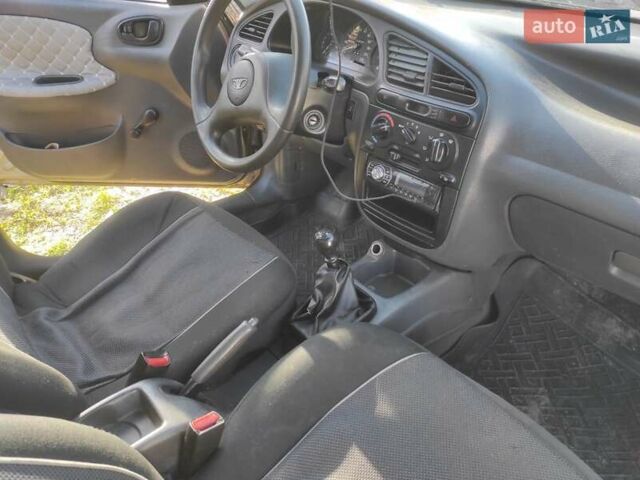 Бежевый Дэу Ланос, объемом двигателя 1.5 л и пробегом 325 тыс. км за 1500 $, фото 4 на Automoto.ua