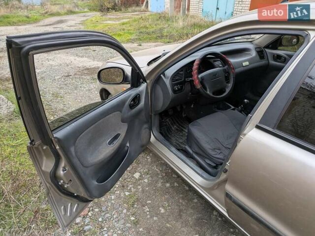 Бежевый Дэу Ланос, объемом двигателя 1.6 л и пробегом 162 тыс. км за 2700 $, фото 12 на Automoto.ua