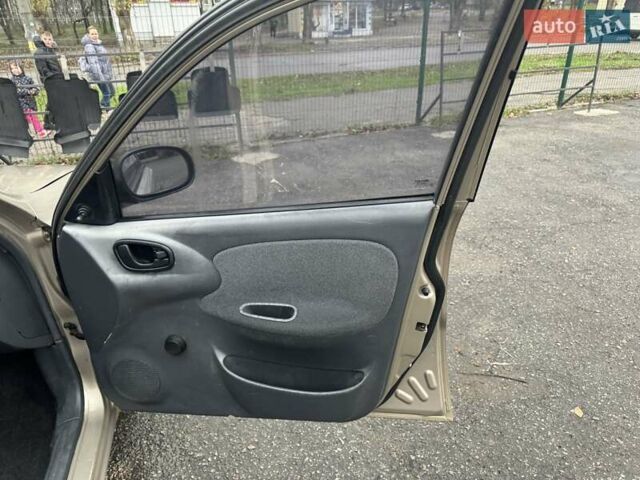 Бежевий Деу Ланос, об'ємом двигуна 1.5 л та пробігом 172 тис. км за 1750 $, фото 10 на Automoto.ua