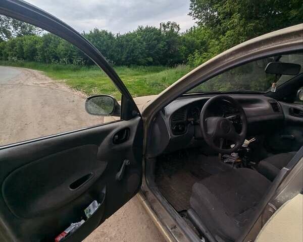 Бежевый Дэу Ланос, объемом двигателя 1.5 л и пробегом 230 тыс. км за 750 $, фото 10 на Automoto.ua