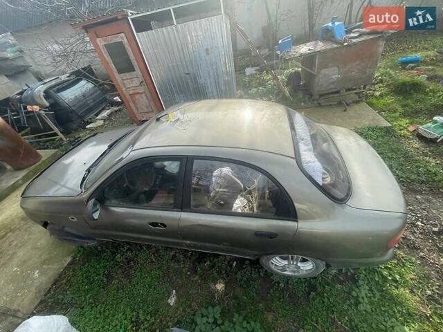 Бежевый Дэу Ланос, объемом двигателя 1.39 л и пробегом 226 тыс. км за 800 $, фото 5 на Automoto.ua