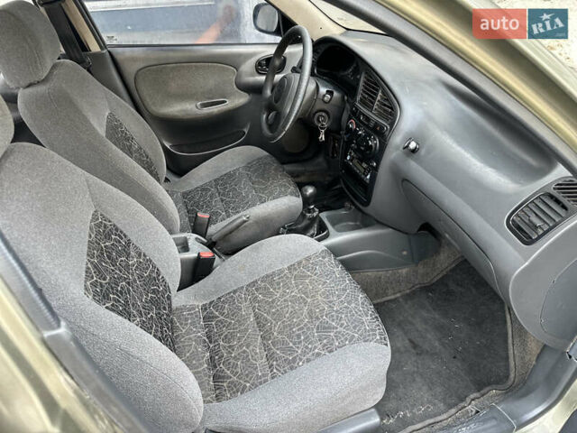 Бежевий Деу Ланос, об'ємом двигуна 1.5 л та пробігом 221 тис. км за 1350 $, фото 24 на Automoto.ua