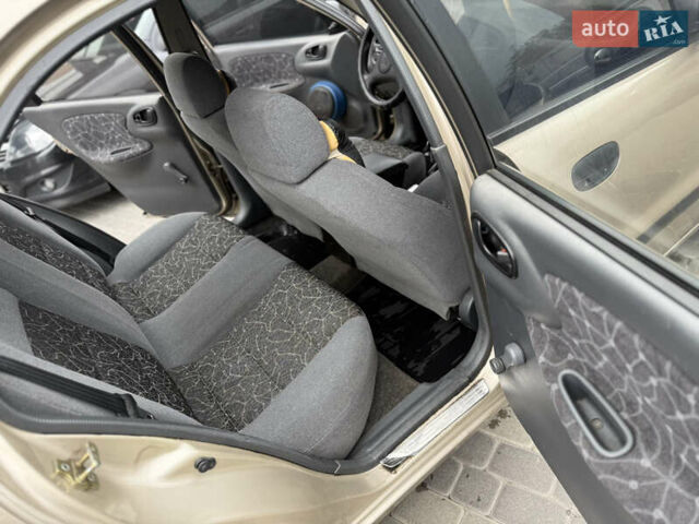 Бежевий Деу Ланос, об'ємом двигуна 1.5 л та пробігом 224 тис. км за 2550 $, фото 19 на Automoto.ua