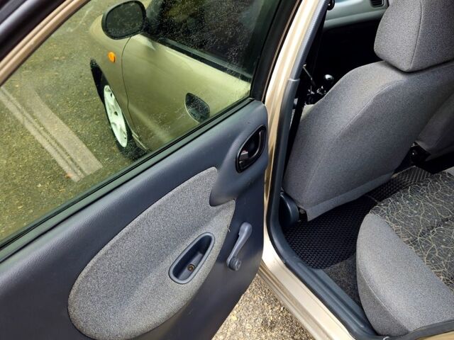 Бежевый Дэу Ланос, объемом двигателя 1.5 л и пробегом 220 тыс. км за 2750 $, фото 7 на Automoto.ua