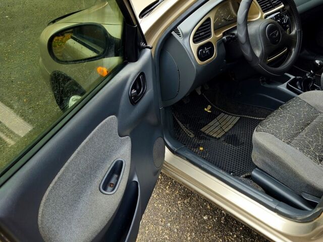 Бежевый Дэу Ланос, объемом двигателя 1.5 л и пробегом 220 тыс. км за 2750 $, фото 6 на Automoto.ua