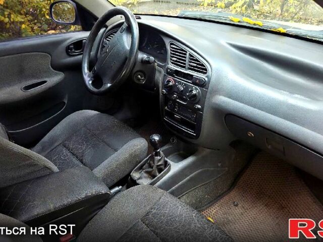 Бежевий Деу Ланос, об'ємом двигуна 1.6 л та пробігом 273 тис. км за 800 $, фото 5 на Automoto.ua