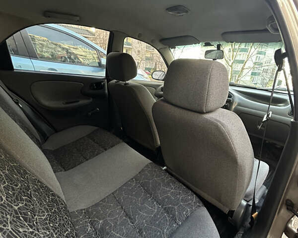 Бежевый Дэу Ланос, объемом двигателя 1.5 л и пробегом 300 тыс. км за 1950 $, фото 7 на Automoto.ua