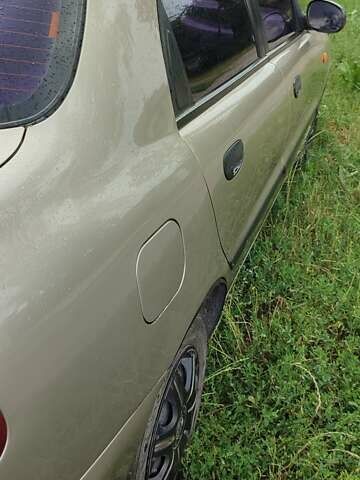 Бежевый Дэу Ланос, объемом двигателя 1.5 л и пробегом 233 тыс. км за 2900 $, фото 8 на Automoto.ua